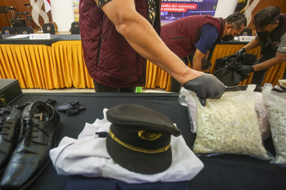 Malaysian pilot faces possible death penalty in Indonesia after police find more than 70,000 ecstasy...