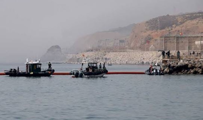 Spain installs a floating barrier after at least 67 people die during a mass migrant rush into Ceuta...