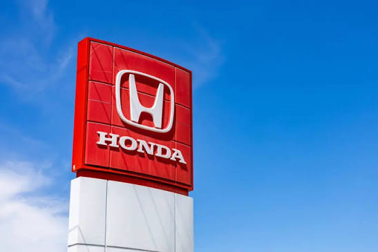 Honda raises its annual earnings forecast after returning to quarterly profit growth, buoyed by a we...