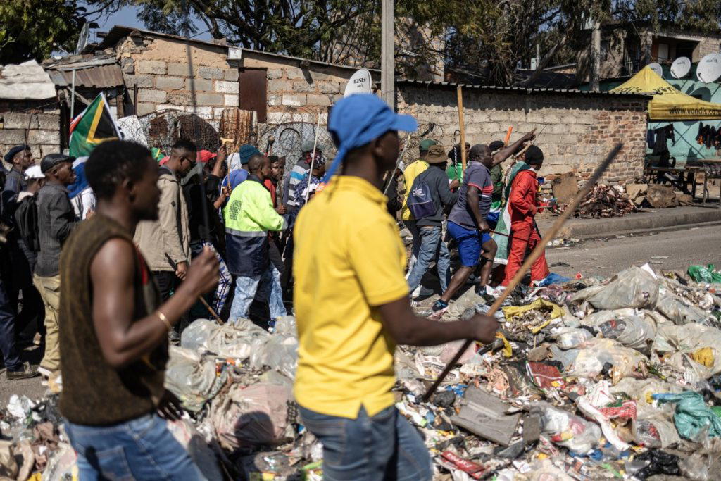 Three foreign nationals were injured in South Africa on Wednesday when a protest against undocumente...