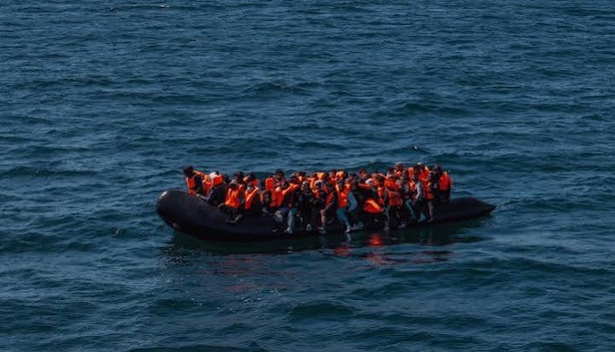 French coastguards rescued 157 migrants after their boat caught fire in the English Channel near Bou...