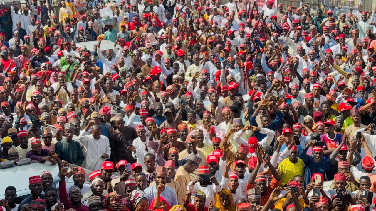 Hundreds of Kwankwasiyya supporters protested at INEC’s Kano office, demanding reinstatement of the...