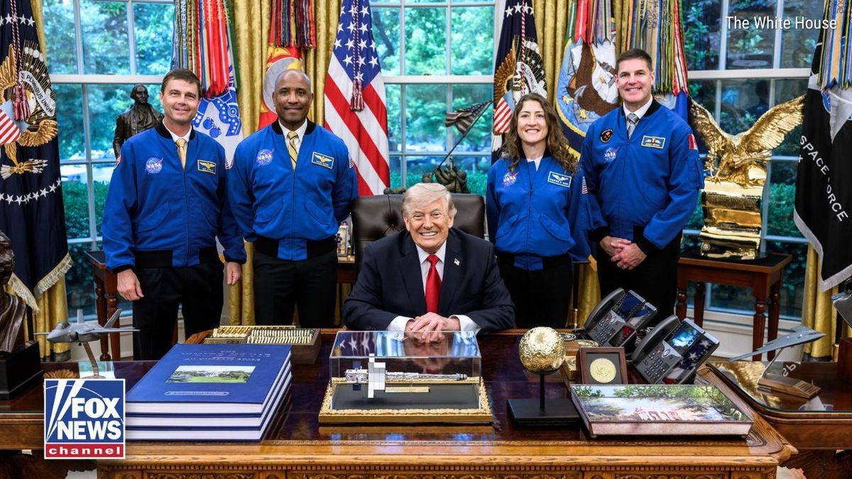 President Trump greets the Artemis II astronauts in the Oval Office to celebrate their historic miss...