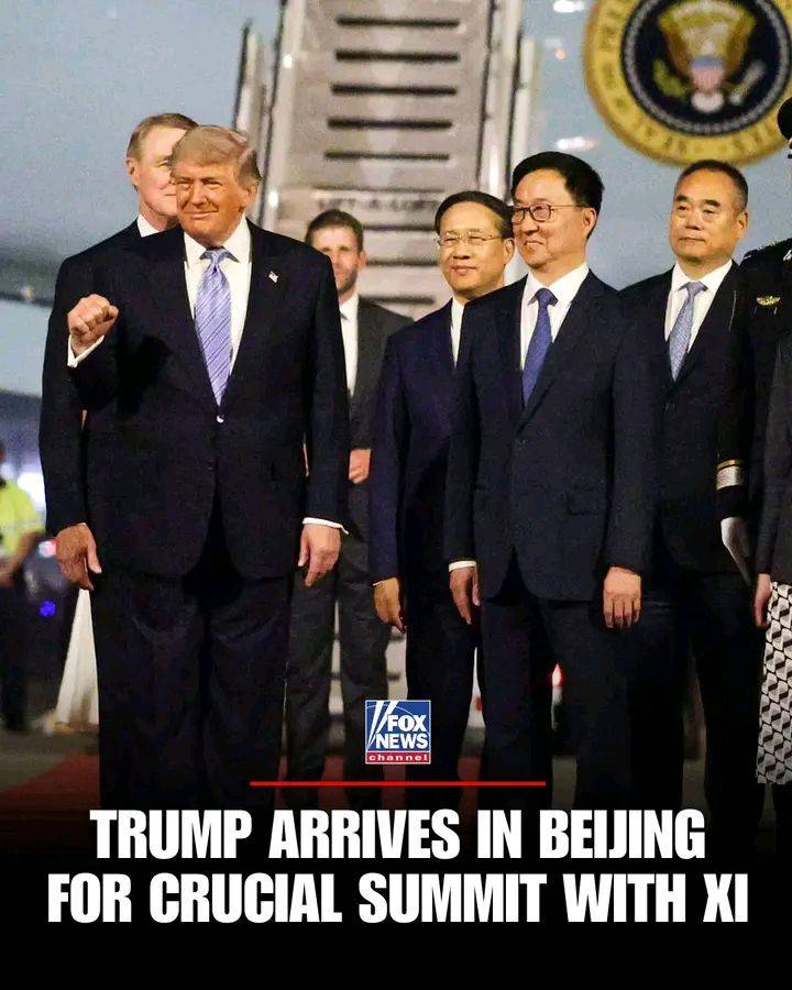 President Trump is greeted by Chinese Vice President Han Zheng and other officials during his red ca...