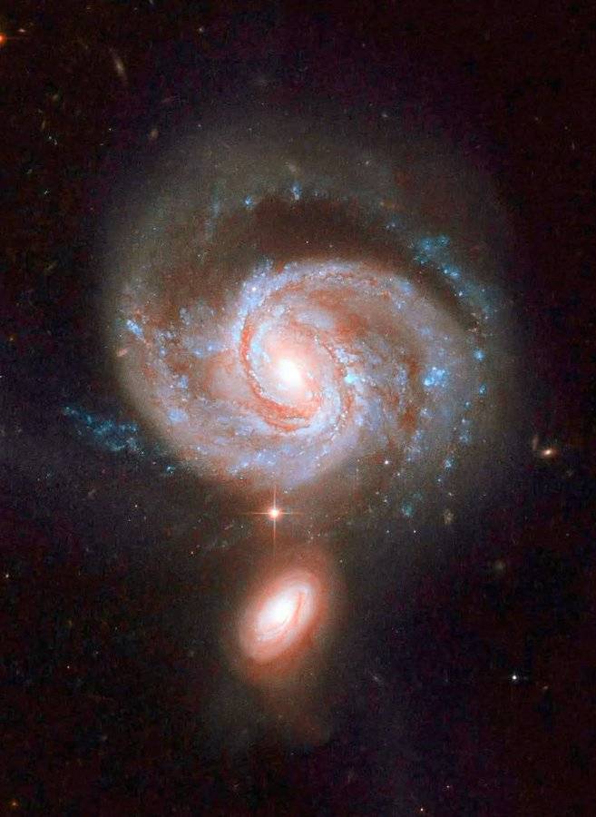 A Cosmic Question Mark, 400 Million Light-Years Away
The universe just dropped the ultimate mic d...