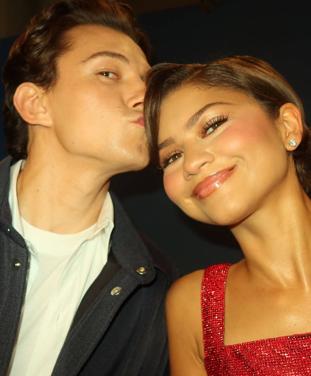 Zendaya wore an aptly red-and-blue sparkly Versace outfit at a the "Spider-Man: Brand New Day" photo...