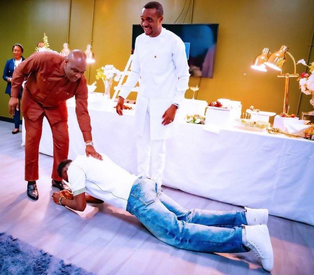 Photo of Super Eagles striker Taiwo Awoniyi prostrating to honour his spiritual father, Apostle Josh...