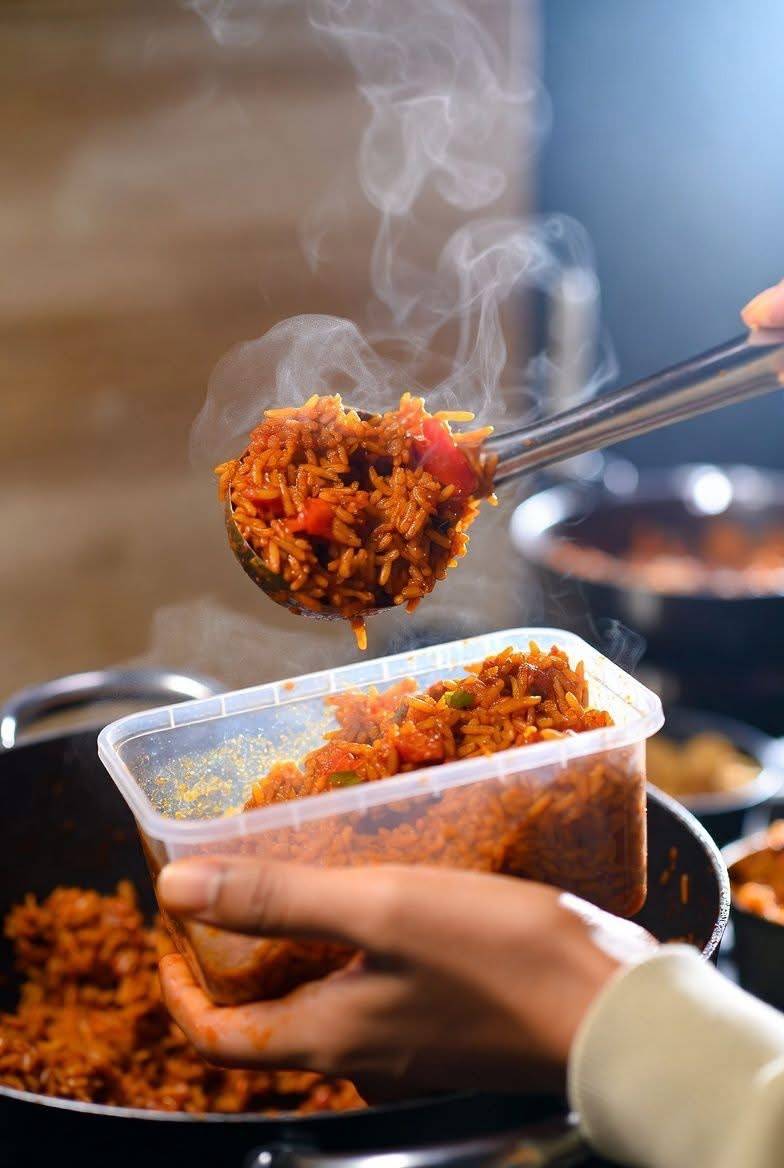 That plastic container the woman at the buka just packed your rice into.
She scooped it from the po...