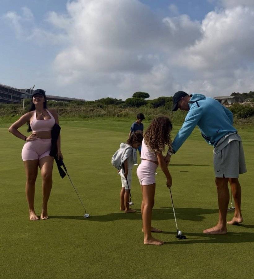 Cristiano Ronaldo and Georgina playing golf
