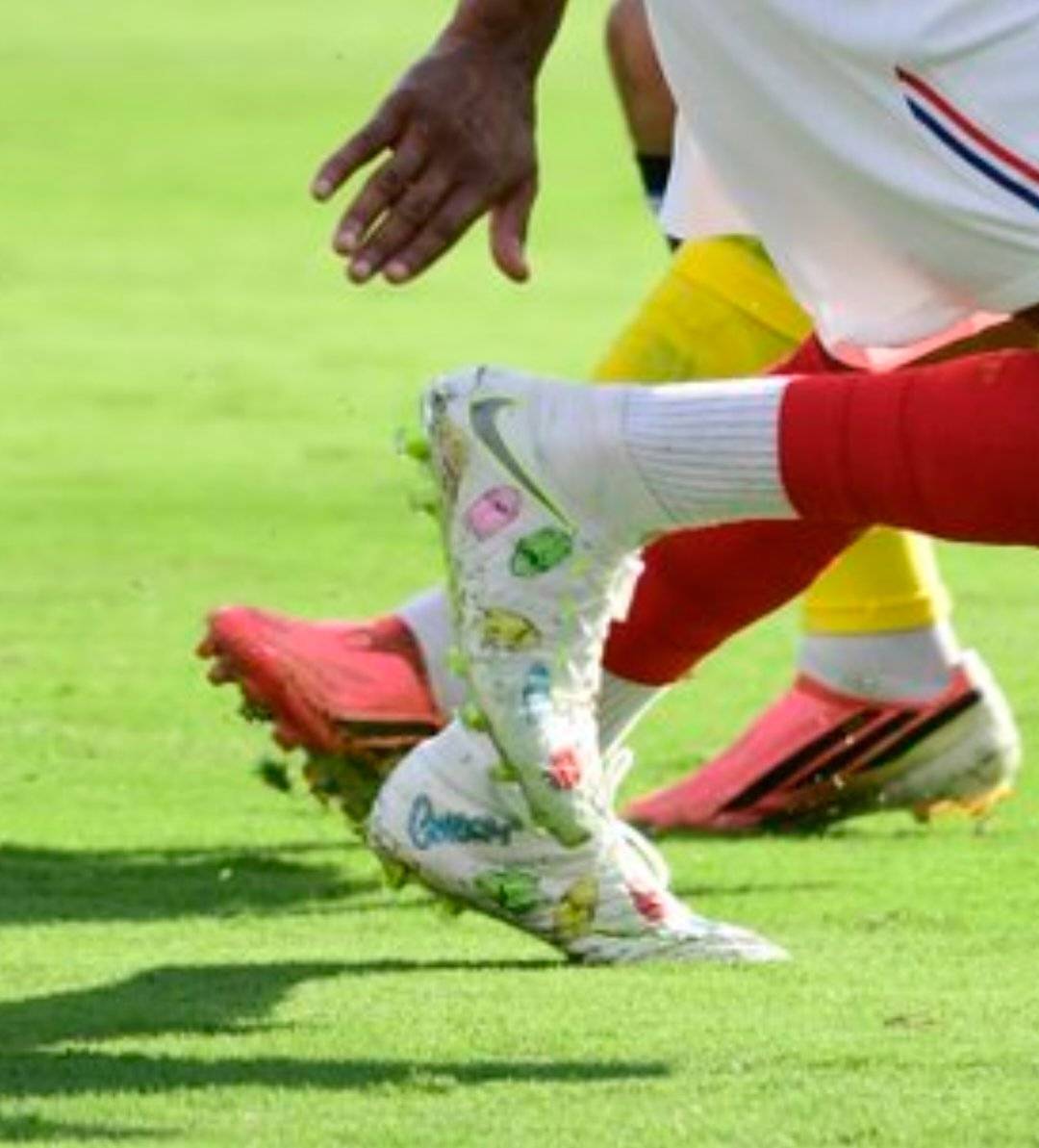 Michael Olise just dropped the most personal boots of the World Cup.
Hand painted doodles, cartoon...