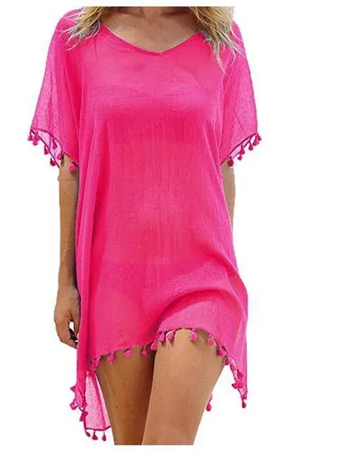 This elegant crochet beach cover-up features delicate lace details and a beautiful hollow-out design...