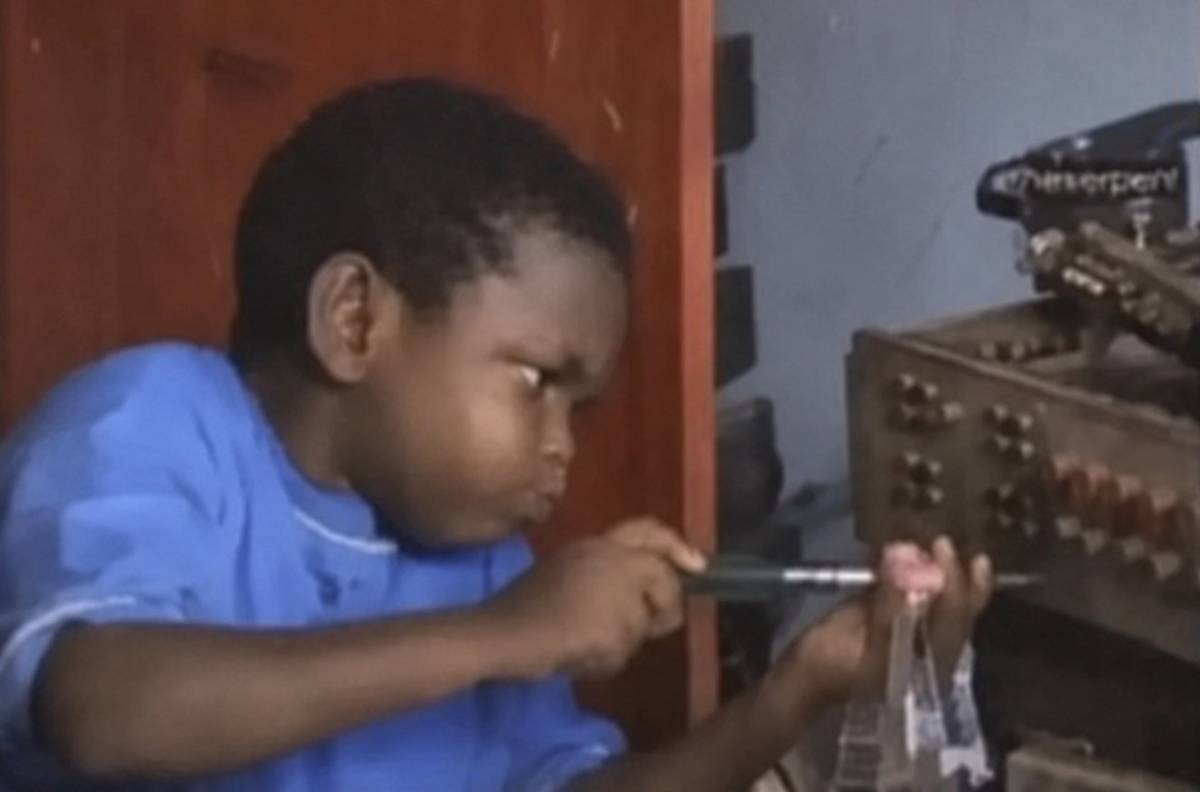 Me bringing out the Blue film CD I inserted into the DVD before nepa took light nd my Dad returns.
....
