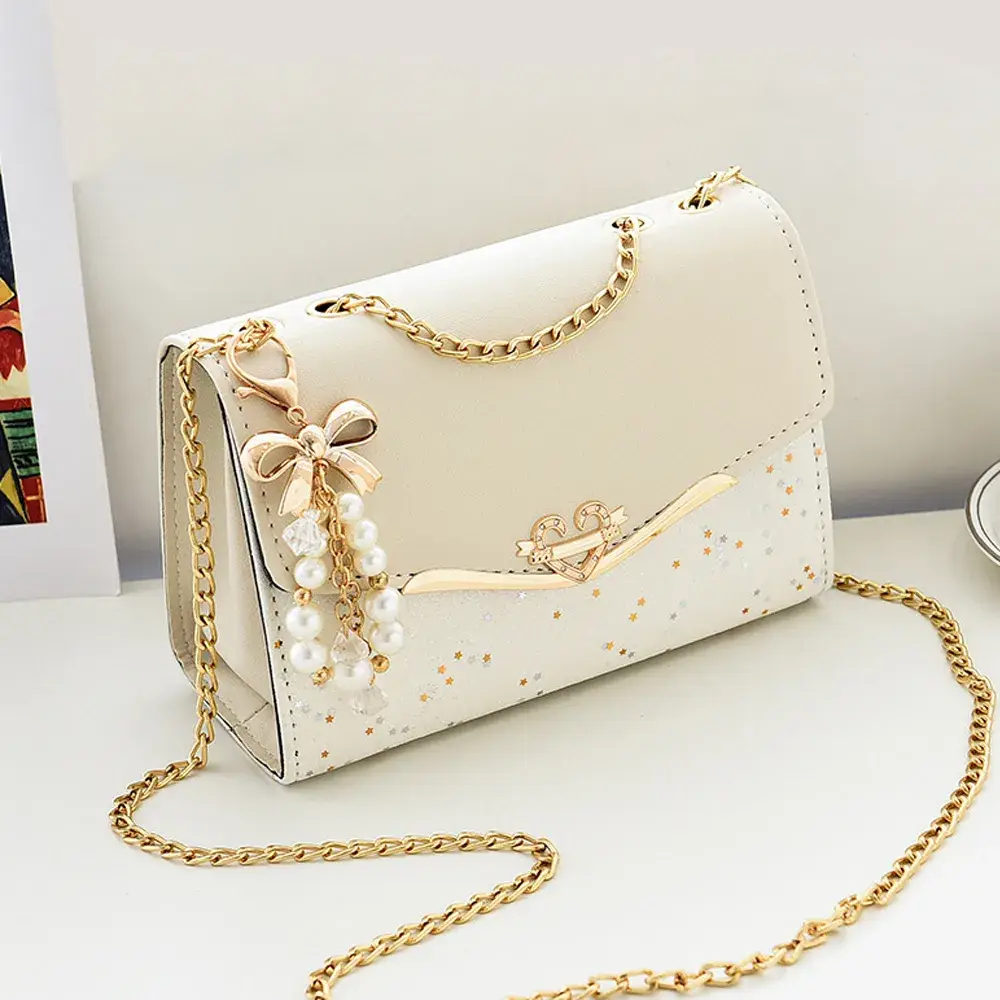 It’s all in the details. 🤍💫

From the star-sequin shimmer to the delicate pearl bow tassel, this c...