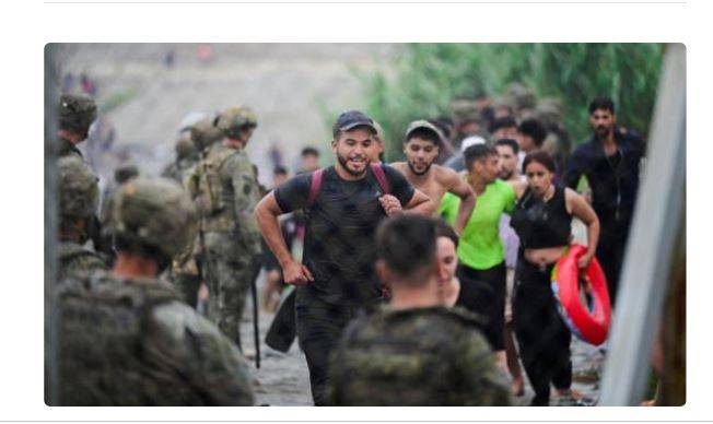 Migrants from Morocco arrive at the Spanish border in Ceuta, Spain, July 31, 2026, as migrants cross...