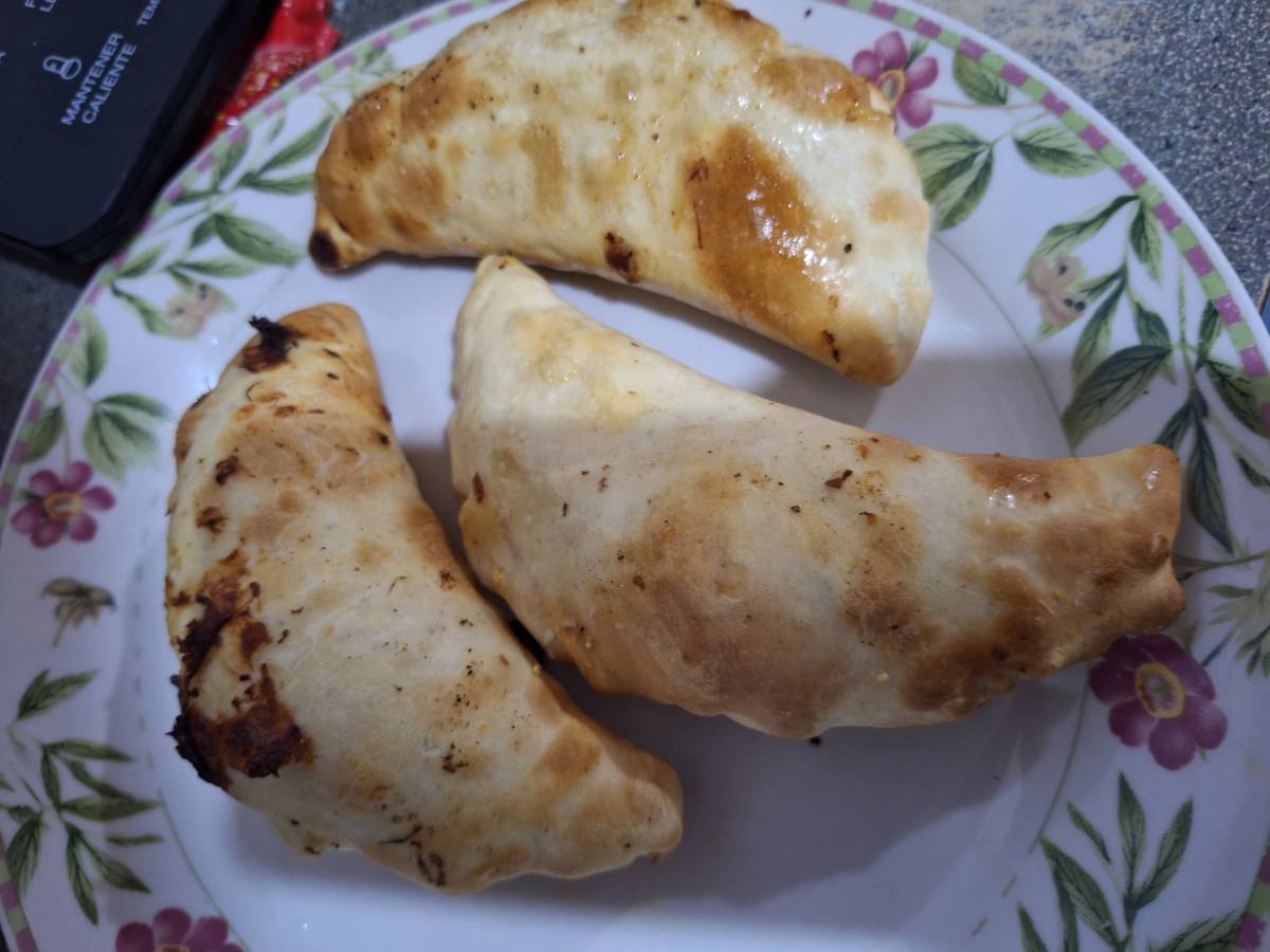 Time to enjoy these almost baked empanadas because I ended up adding oil to them, so they're not so...