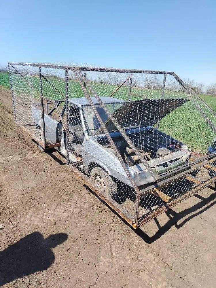 Russian Army's homemade pickup truck fitted with an improvised anti-drone cage.
War is ugly. It sho...