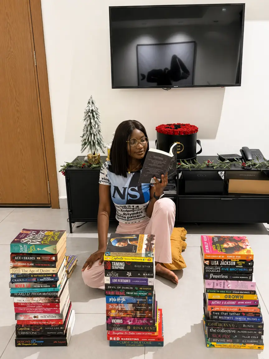 Ghanian book content creator Stella Adjei explained how she successfully read 120 books in 2025, as...