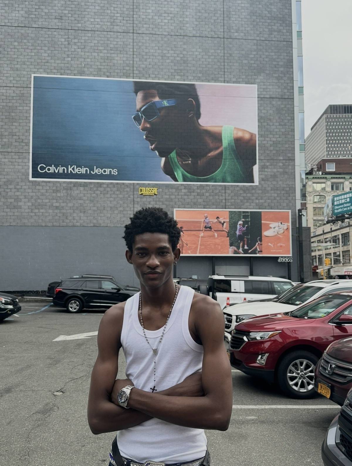 Nigerian model Evans Ikechukwu shared a picture posing in front of his very own Calvin Klein billboa...