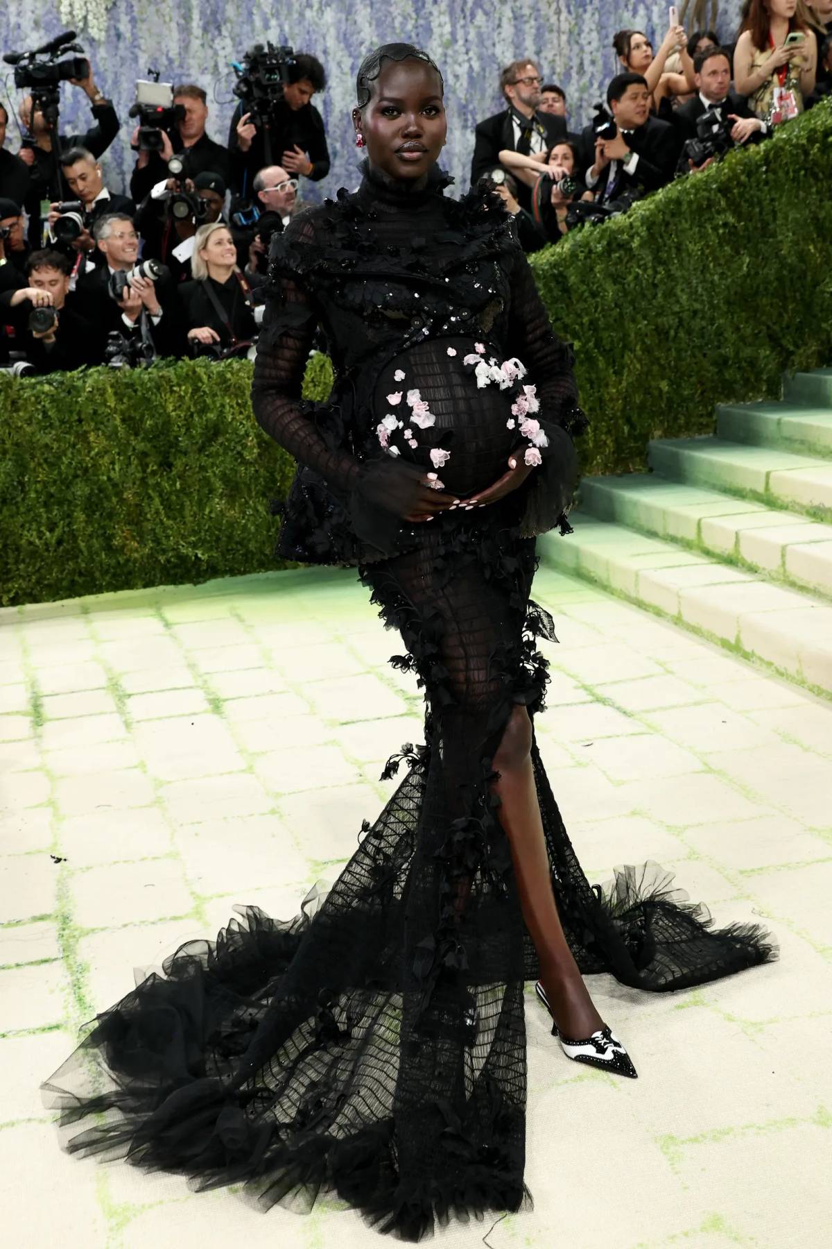 South Sudanese-Australian supermodel and activist Adut Akech at the #MetGala 2026 wearing custom Tho...
