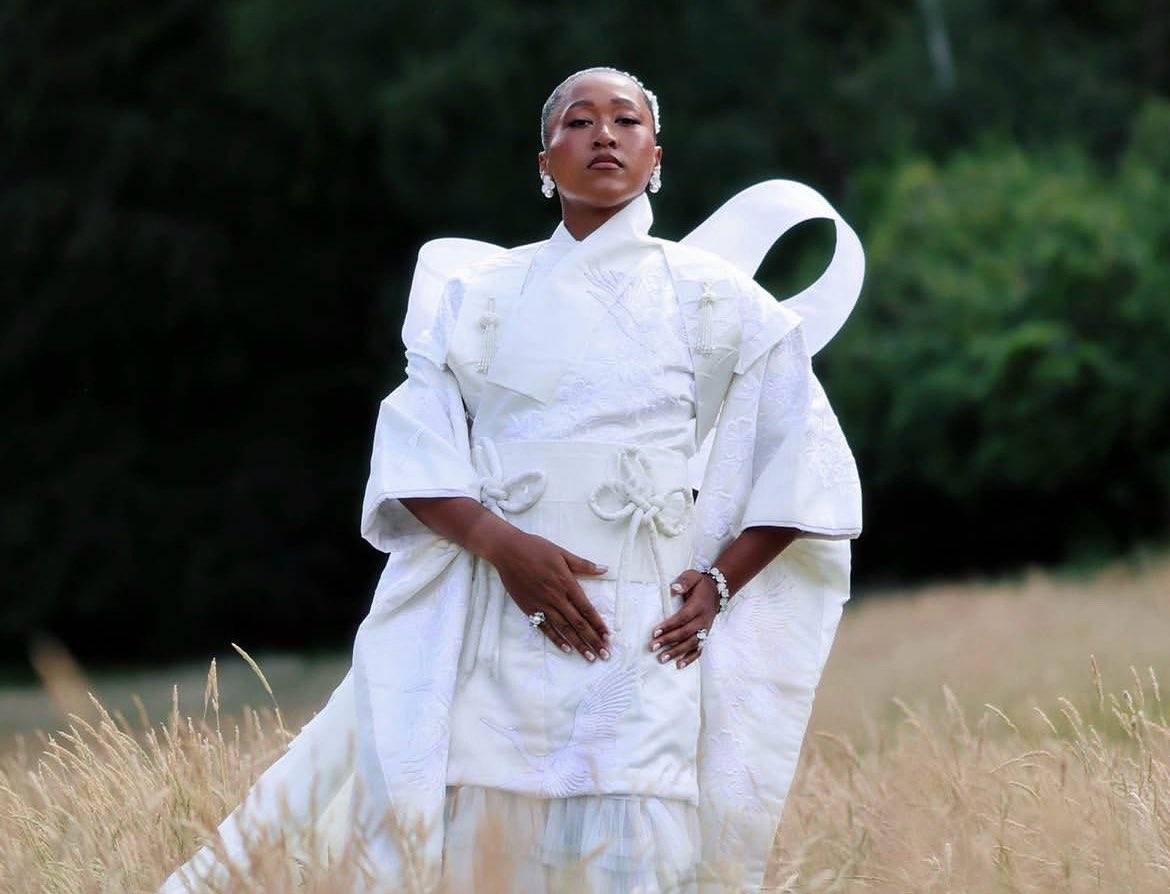 Naomi Osaka just made her highly-anticipated #Wimbledon2026 entrance in an all-white gown inspired b...