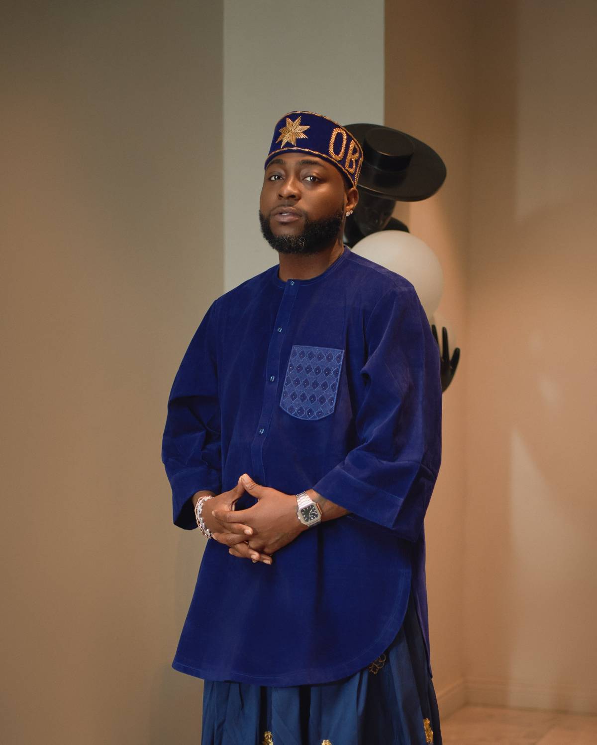 Davido shared pictures of himself wearing an special celebration outift designed by Nigerian brand L...