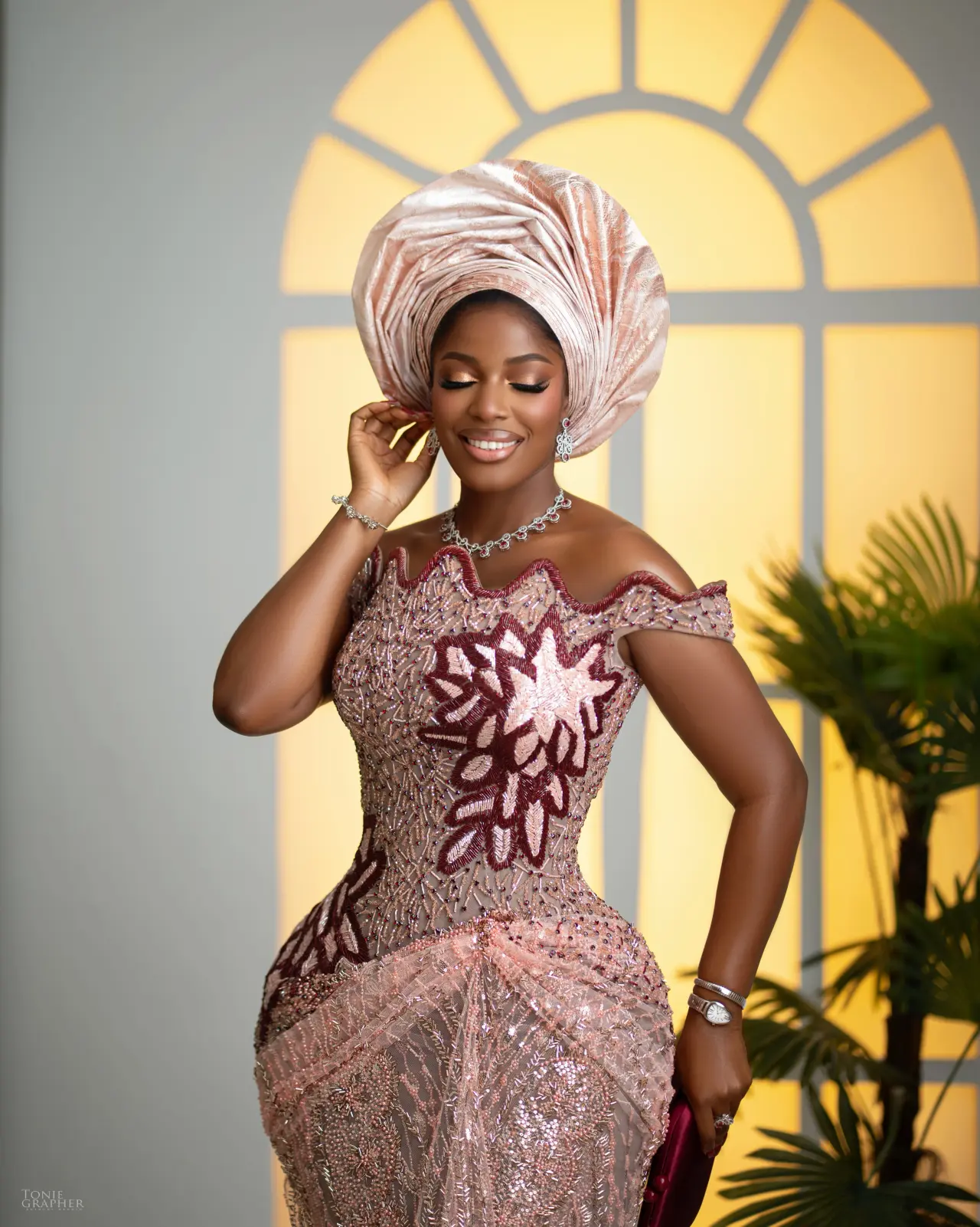 Chef Hilda Baci attended her sister Princess’s wedding in a custom peach dress designed by Nigerian...