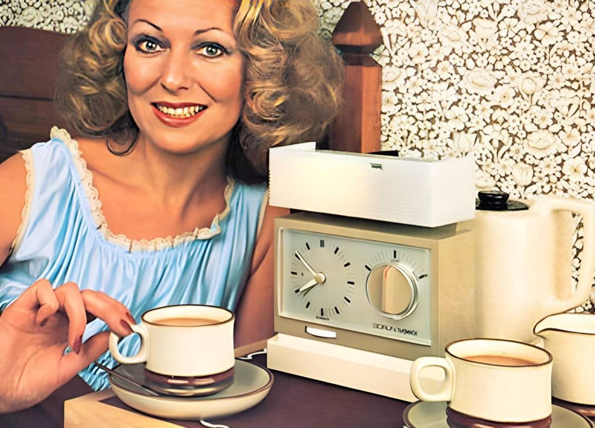 In Britain in the 1970s there was a very popular device called "Teasmade".
It was an alarm clock tha...