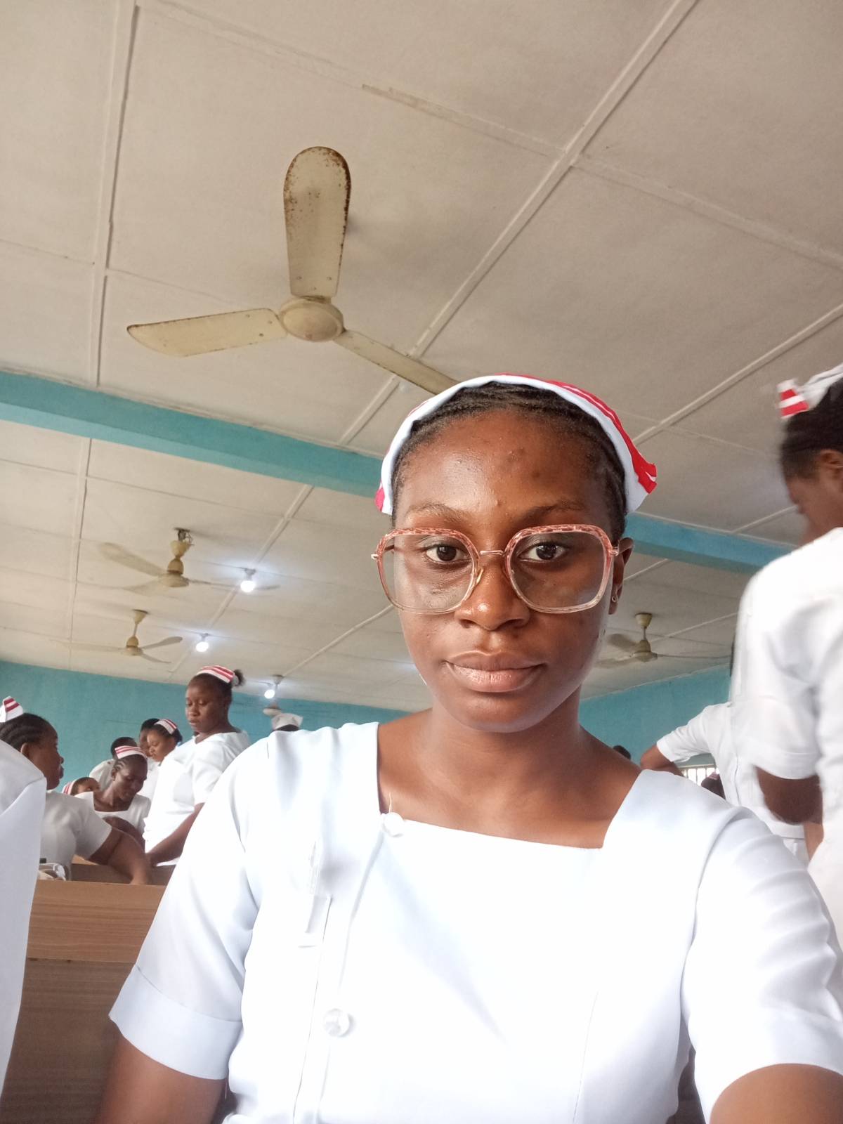 I'm Eno. Nursing student. National NANSM PRO.
I watch families pray while mothers suffer. I hear "v...