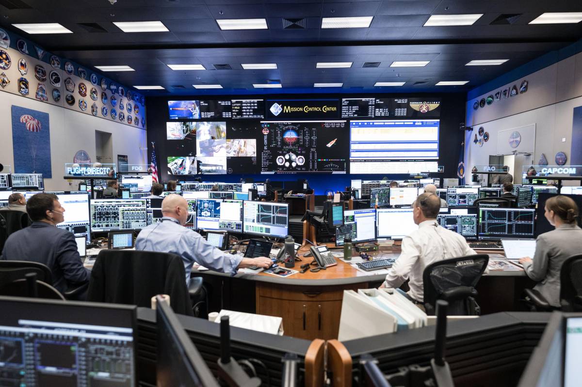 Behind the four astronauts of Artemis II are hundreds of people tracking their every move: monitorin...