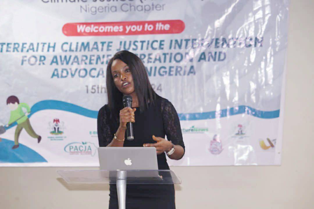 “Peace begins with a conversation. Justice for our climate secures our future.”