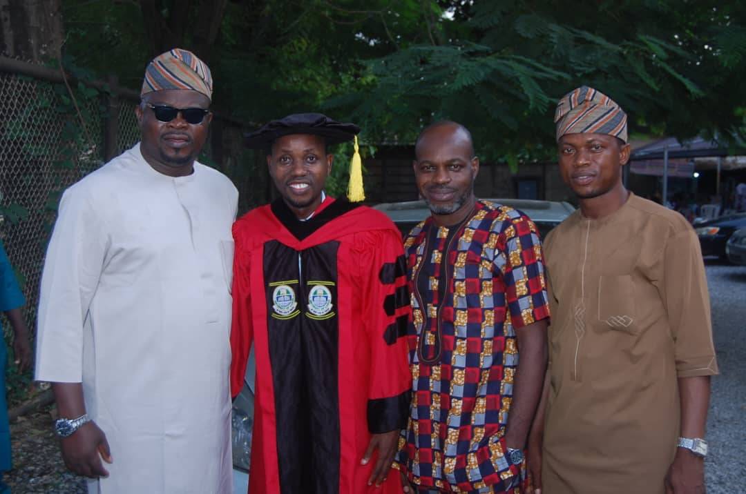 Dr Falobi, with Chris and Dr Balogun celebrating with Dr Abiona Emmanuel, on his convocation day in...