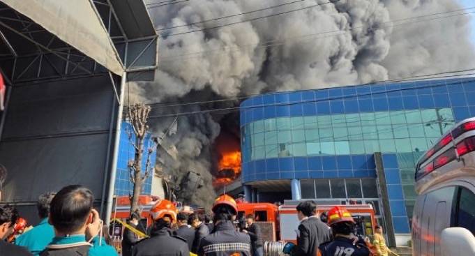 Fourteen killed, 59 injured in South Korea car parts factory fire.