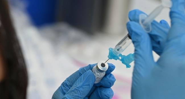 Two nurses have been arrested in connection with the death of two young sisters following an alleged...
