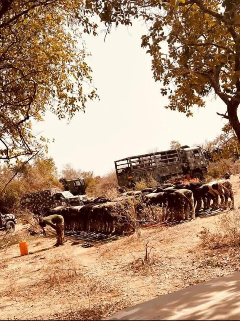 ๐ณ๐ฌ In the heart of the bush, far from home and closer to danger, they kneel together. No mosque. No...