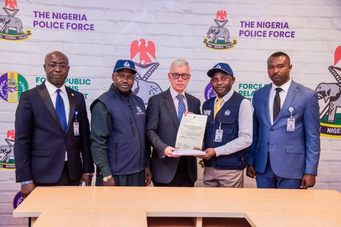 Nigeria Police returns $23,000 recovered from an alleged international romance scammer to the Britis...