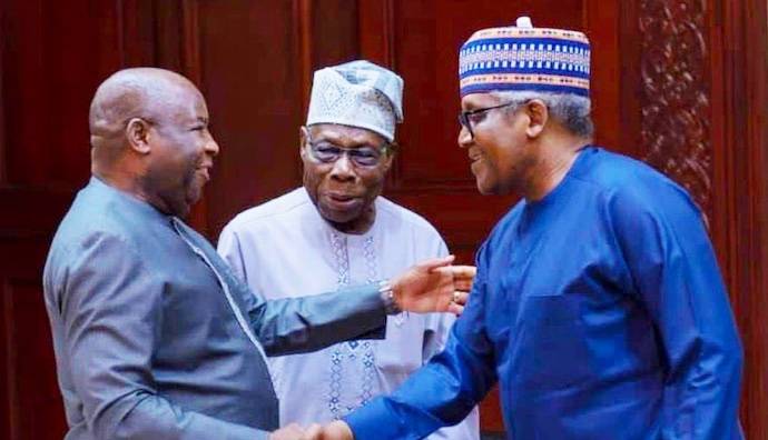The Chairman of the Dangote Group, Alhaji Aliko Dangote, along with former Nigerian President Oluseg...