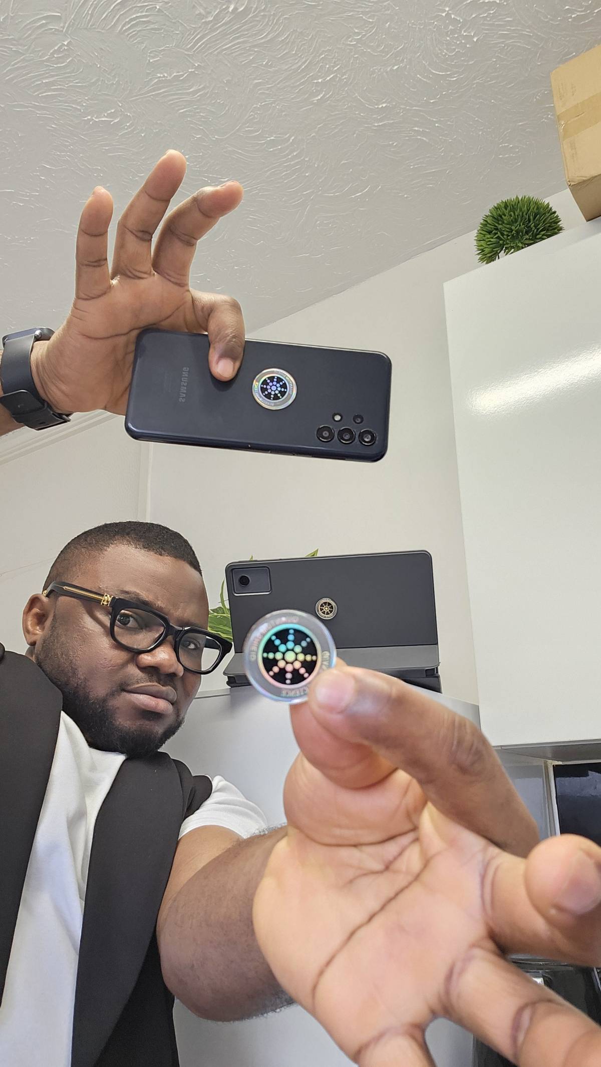 This is a QUANTUM SHIELD STICKER. They said it shields the gadgets user from EMF radiation from the...