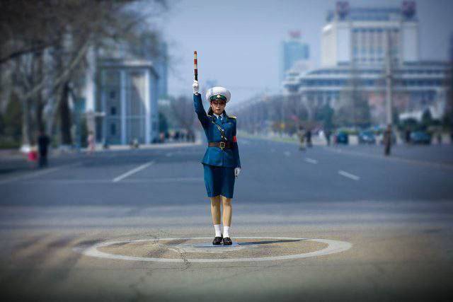 There are no traffic lights in North Korea, they are replaced by traffic controllers on the roads.