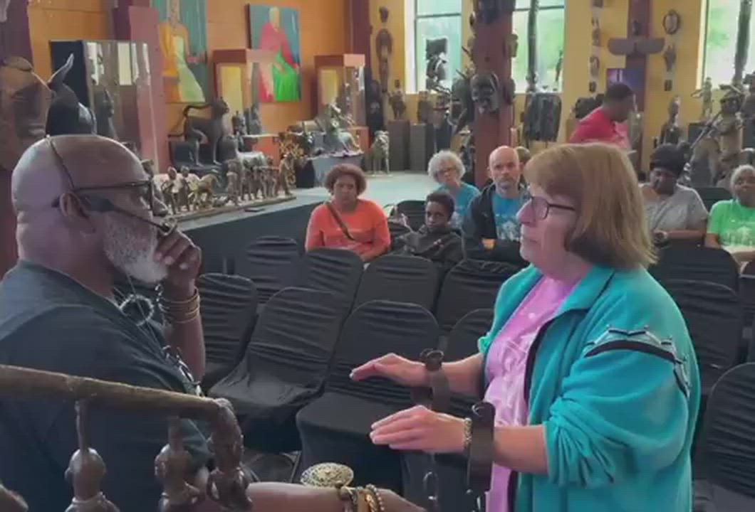 Roots 101 African American Museum in Louisville, Kentucky, showing a white woman tearfully experienc...