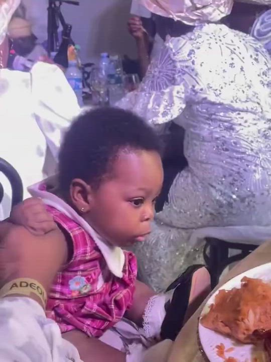 Trending video of a baby girl desperately reaching for food at party sparks laughter and adorable re...