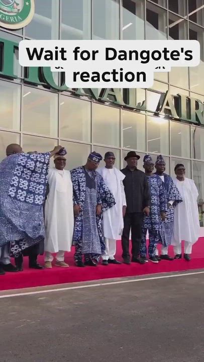The Moment A Man tried putting President Bola Tinubu’s signature cap on Nigerian businessmen, Aliko...