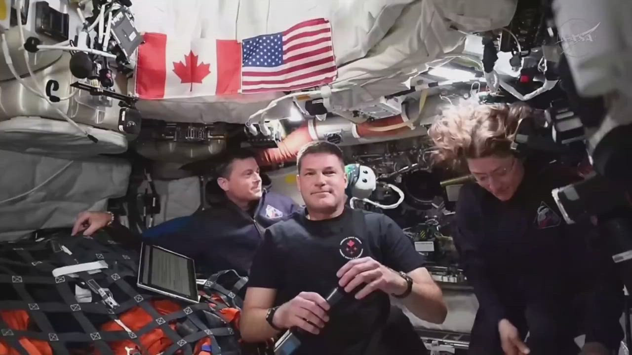 Artemis II astronauts Jeremy Hansen and Reid Wiseman answering a child's question on star visibility...