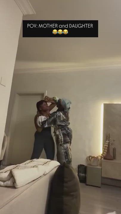 Funny moment as Waje and her daughter playfully wrestle and banter each other