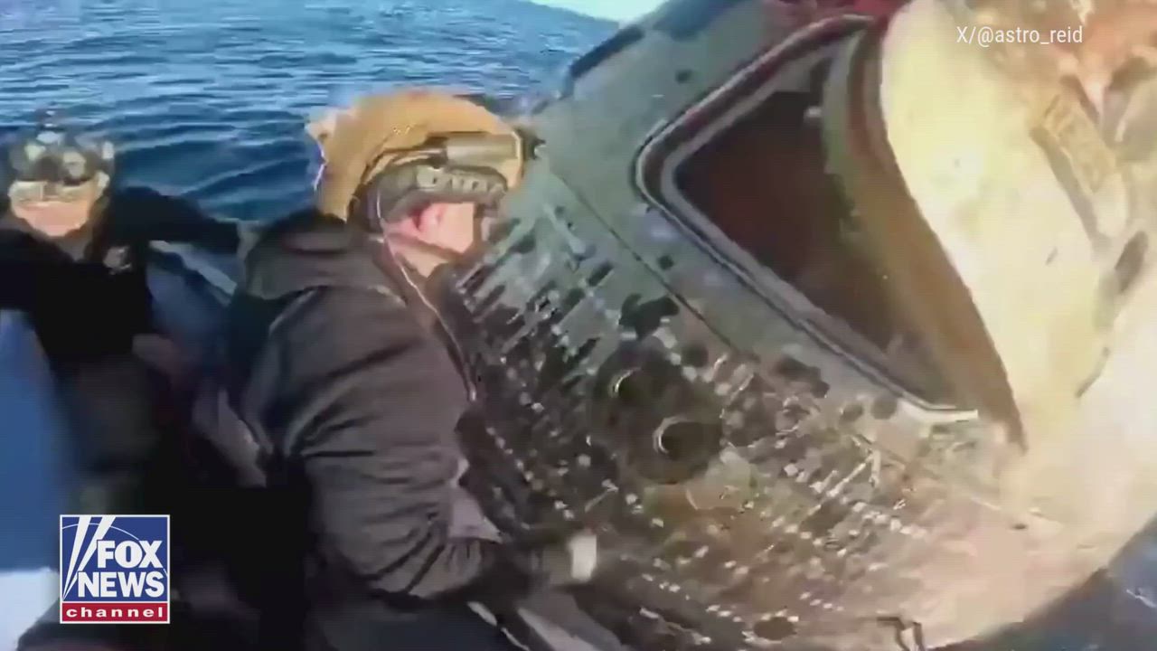 Video of historic moment a recovery team reaches the Artemis II crew after splashing down in the Pac...