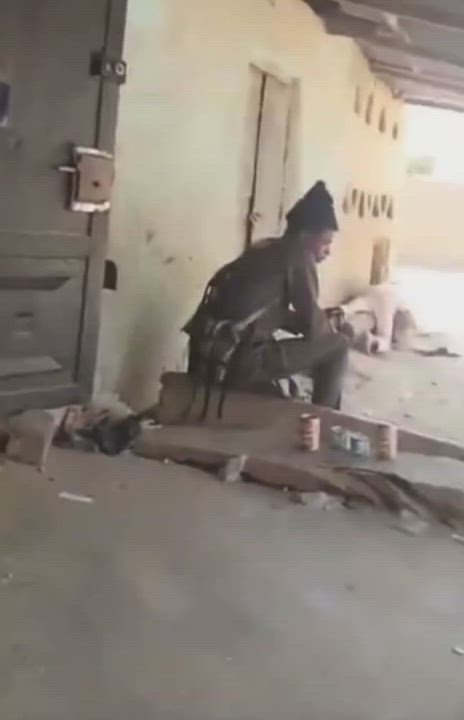 Man shares disturbing video of a kid carrying an AK-47 rifle in broad daylight