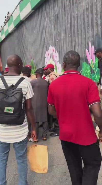 Man calls out road safety officers  as he shows a rod he claims he collected from a road safety offi...