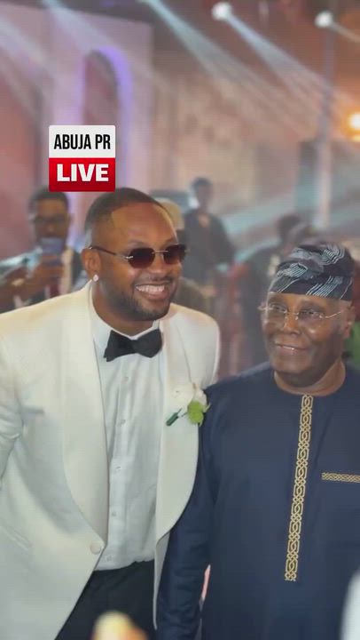 Former Vice President Atiku Abubakar dancing with Cross’ mum during his wedding reception in Abuja e...