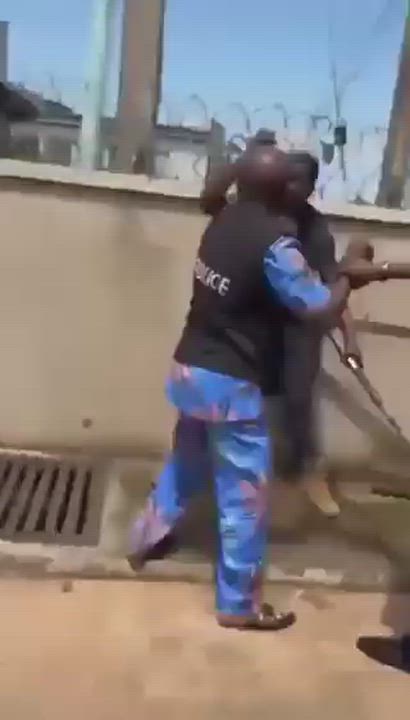 Nigerians police officer fighting a NSCDC officer