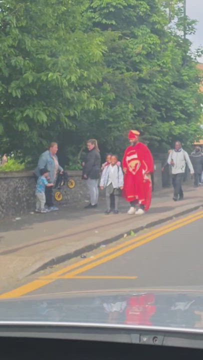 An Arsenal Fan Was Spotted In London Walking His Kids To School Dressed Like This… 😅😂🤣