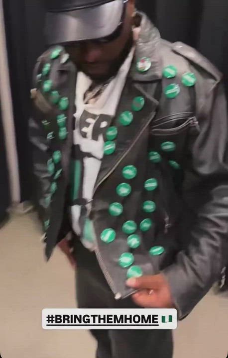 Davido wore a customized jacket that carried names of the all pupils kidnapped by bandits in Oyo sta...